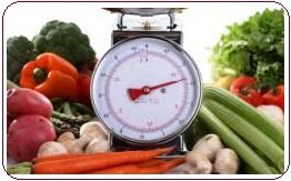 Organice garden fertilizer produces big vegetables on scales