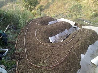 Laying down irrigation pipes